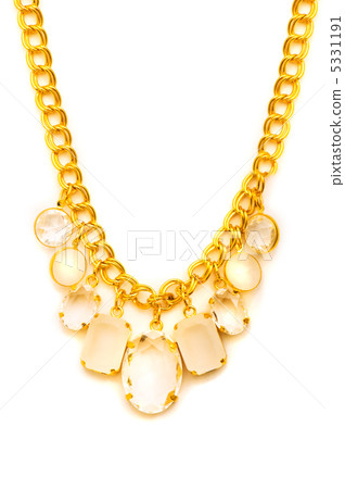 Golden necklace isolated on the white background Golden necklace isolated on the white background 5331191