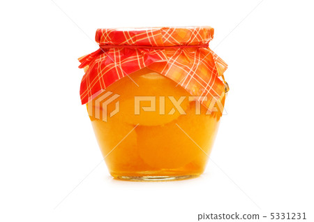 Jar with peaches isolated on the white Jar with peaches isolated on the white 5331231