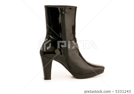 Black boots isolated on the white background Black boots isolated on the white background 5331243