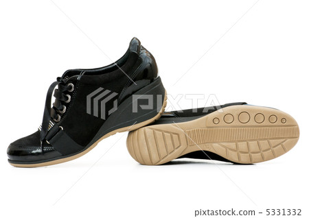 Woman shoes isolated on the white background Woman shoes isolated on the white background 5331332