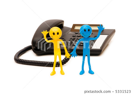 Phone support concept - smilie and telephone isolated on white Phone support concept - smilie and telephone isolated on white 5331523