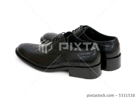 Black shoes isolated on the white background Black shoes isolated on the white background 5331538