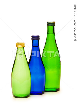 Bottles of water isolated on the white Bottles of water isolated on the white 5331601