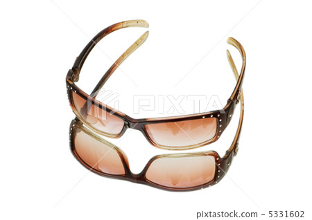 Stylish sunglasses isolated on the white background Stylish sunglasses isolated on the white background 5331602
