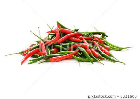 Red and green chili peppers isolated on the white Red and green chili peppers isolated on the white 5331603
