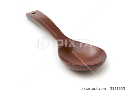 Wooden spoon isolated on the white background Wooden spoon isolated on the white background 5331635
