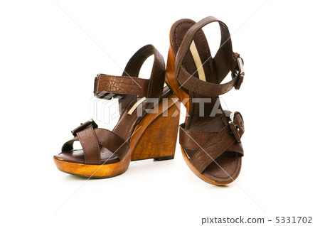 Woman shoes isolated on the white background Woman shoes isolated on the white background 5331702
