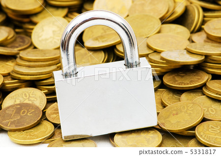 Concept of financial security with lock and coins Concept of financial security with lock and coins 5331817