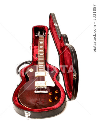 Guitar in open case isolated on the white background Guitar in open case isolated on the white background 5331887