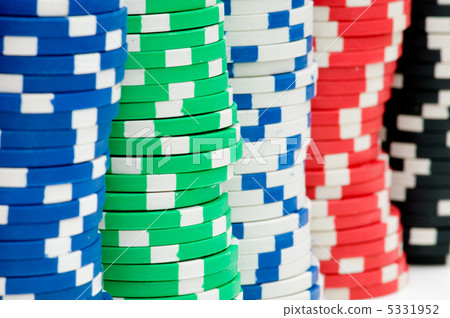 Various colourful casino chips in the stacks 5331952
