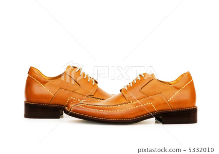 Orange shoes isolated on the white background Orange shoes isolated on the white background 5332010