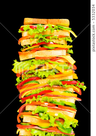 Tall sandwich isolated on the black background 5332034