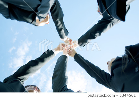 Businessman and businesswoman pointing to fingers Businessman and businesswoman pointing to fingers 5344561