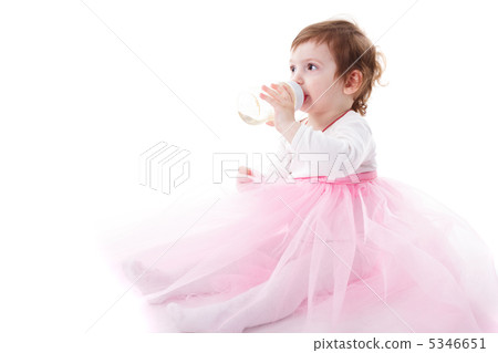 Girl is drinking from bottle isolated Girl is drinking from bottle isolated 5346651