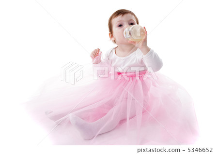 Girl is drinking from bottle isolated Girl is drinking from bottle isolated 5346652