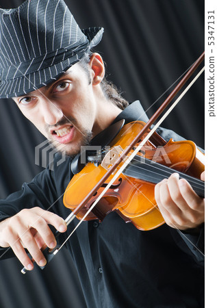 Fiddler playing the violin Fiddler playing the violin 5347131