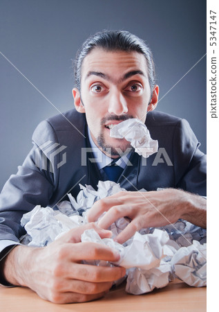 Businessman throwing paper away Businessman throwing paper away 5347147