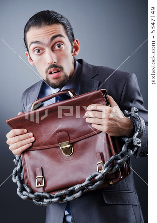 Arrested businessman in studio shooting Arrested businessman in studio shooting 5347149