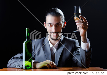 Man tasting wine in glass Man tasting wine in glass 5347154