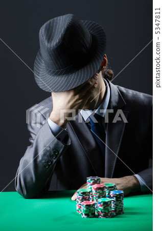 Man playing in the casino 5347811