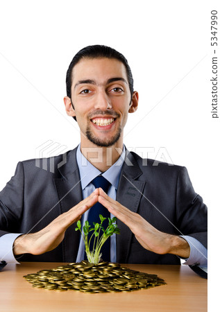 Businessman with gold seedlings and coins Businessman with gold seedlings and coins 5347990