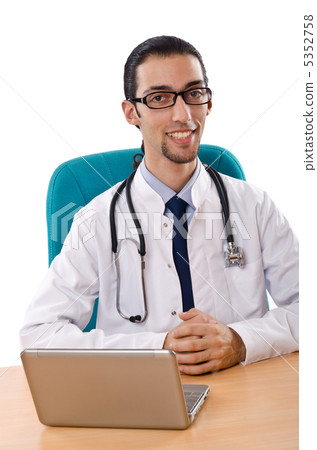 Male doctor working on laptop Male doctor working on laptop 5352758