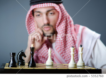 Chess player playing his game Chess player playing his game 5352760