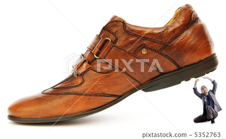 Woman domination concept with shoes and man Woman domination concept with shoes and man 5352763