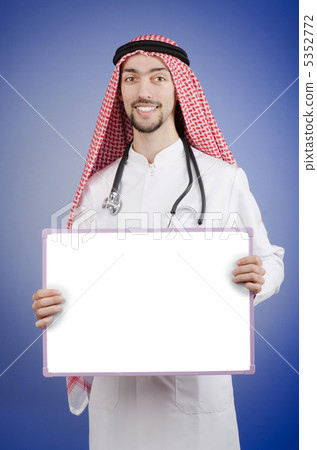 Arab doctor with blank message board Arab doctor with blank message board 5352772