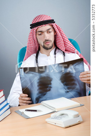 Arab doctor with x-ray print Arab doctor with x-ray print 5352773