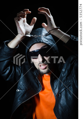 Young criminal with handcuffs 5352774