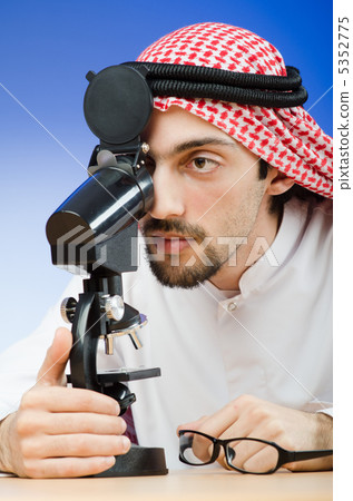Arab chemist working in lab 5352775