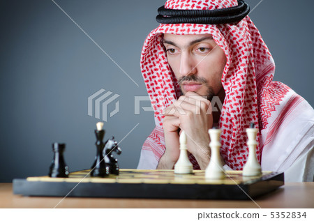 Chess player playing his game Chess player playing his game 5352834