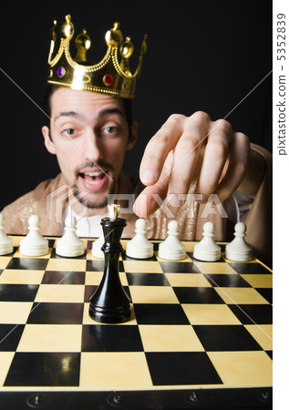 Chess player playing his game Chess player playing his game 5352839