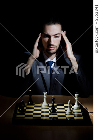 Chess player playing his game Chess player playing his game 5352841