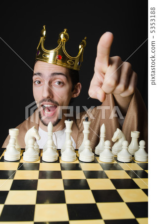 Chess player playing his game Chess player playing his game 5353188