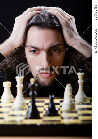 Chess player playing his game Chess player playing his game 5353383
