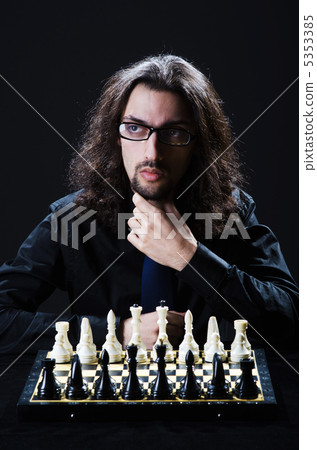 Chess player playing his game Chess player playing his game 5353385