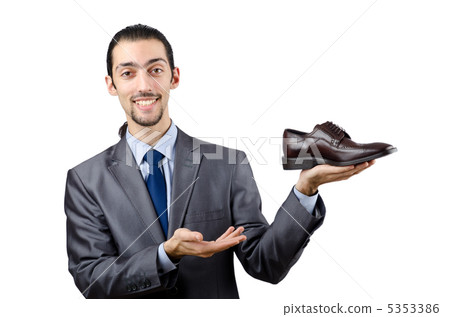 Man with a selection of shoes Man with a selection of shoes 5353386