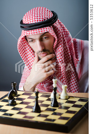 Chess player playing his game Chess player playing his game 5353612