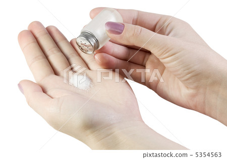 hand holding a saltshaker hand holding a saltshaker 5354563