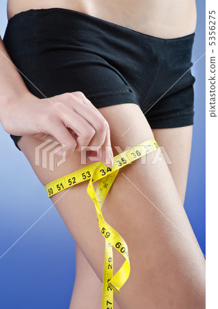 Young lady in dieting concept 5356275