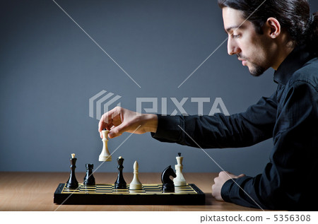Chess player playing his game Chess player playing his game 5356308