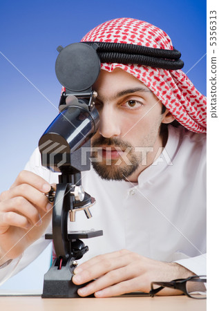 Arab chemist working in lab Arab chemist working in lab 5356313