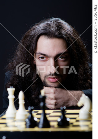 Chess player playing his game Chess player playing his game 5356462