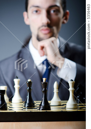 Chess player playing his game Chess player playing his game 5356463