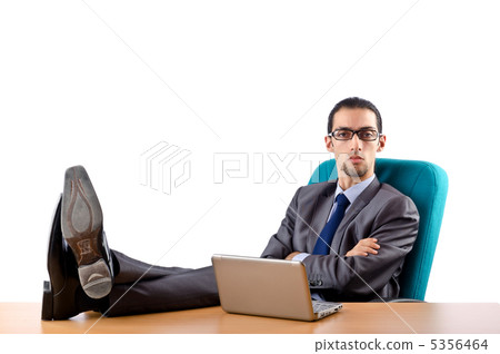 Businessman sitting at the desk Businessman sitting at the desk 5356464