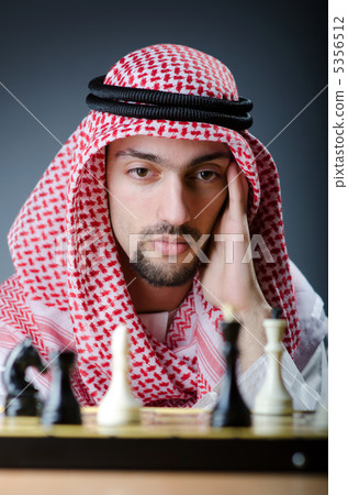 Chess player playing his game 5356512