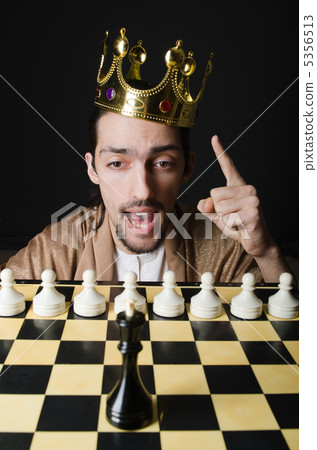 Chess player playing his game Chess player playing his game 5356513
