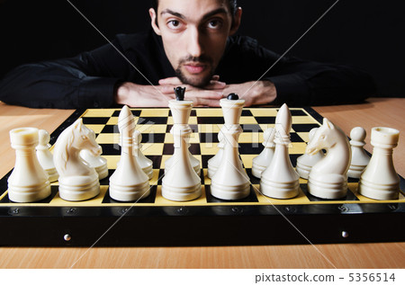 Chess player playing his game Chess player playing his game 5356514